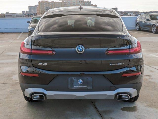 used 2025 BMW X4 car, priced at $56,971