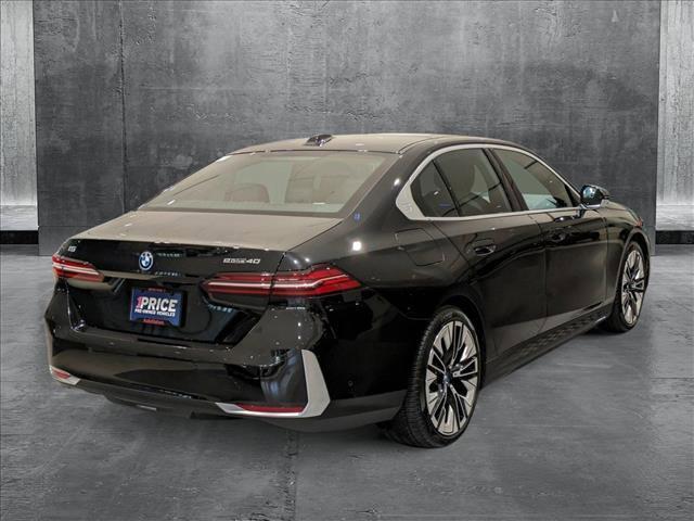 used 2024 BMW i5 car, priced at $54,993