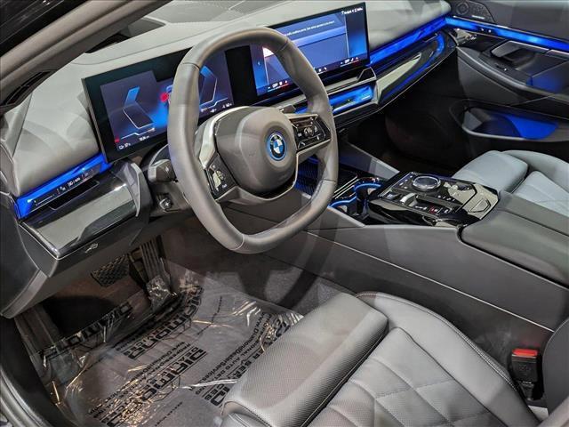 used 2024 BMW i5 car, priced at $54,993