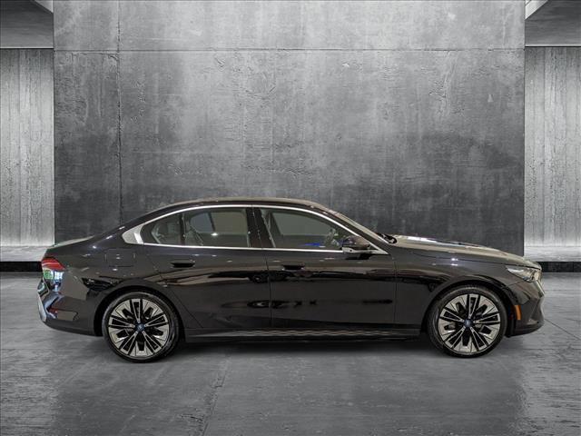 used 2024 BMW i5 car, priced at $54,993