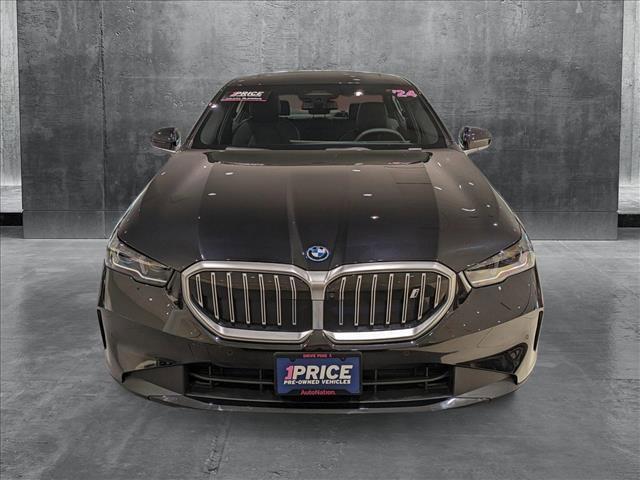 used 2024 BMW i5 car, priced at $54,993