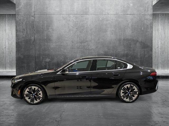 used 2024 BMW i5 car, priced at $54,993