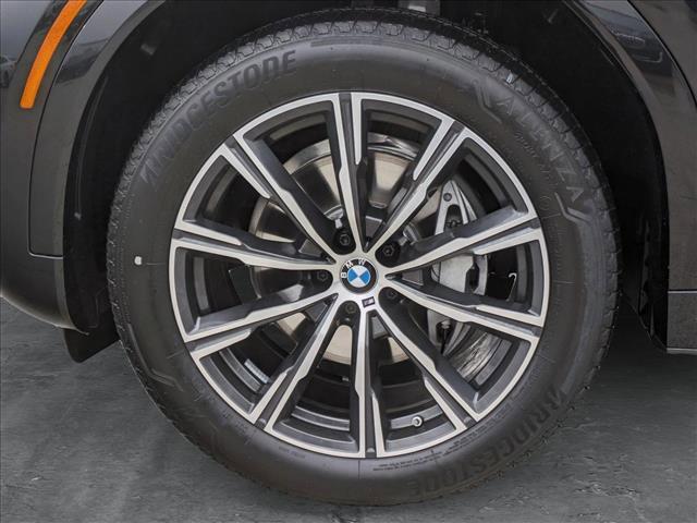 new 2025 BMW X6 car, priced at $77,875