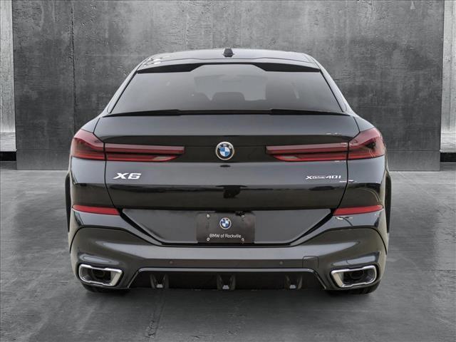 new 2025 BMW X6 car, priced at $77,875