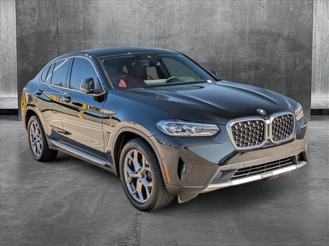 used 2023 BMW X4 car, priced at $45,690