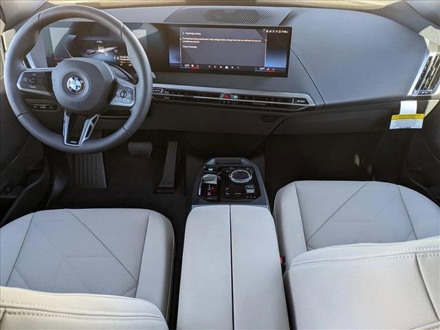 new 2025 BMW iX car, priced at $100,325