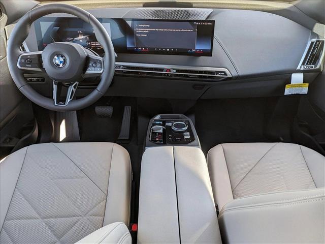 new 2025 BMW iX car, priced at $100,325