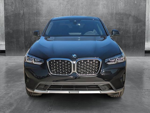 used 2025 BMW X4 car, priced at $57,650