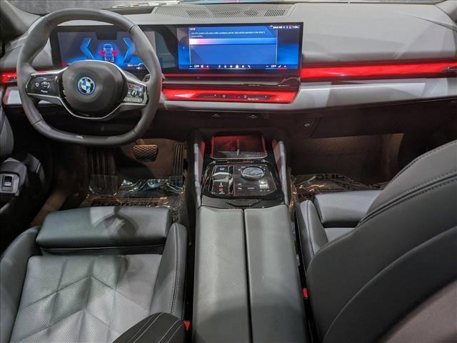 used 2024 BMW i5 car, priced at $61,883