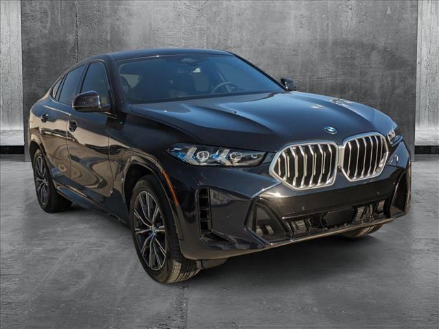 new 2025 BMW X6 car, priced at $77,875