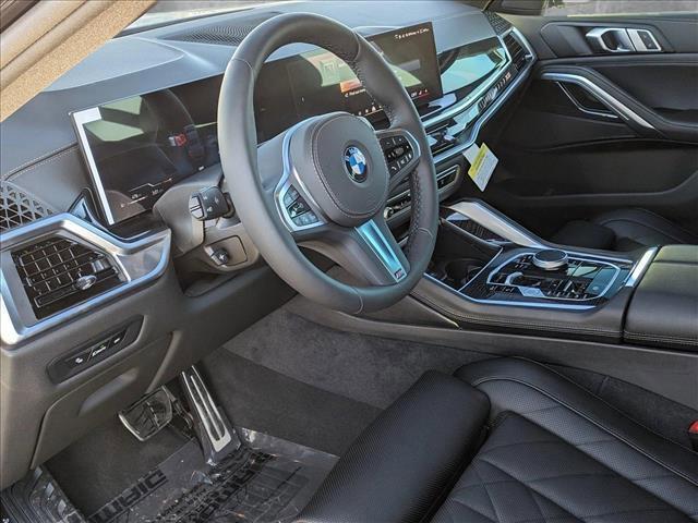 new 2025 BMW X6 car, priced at $77,875