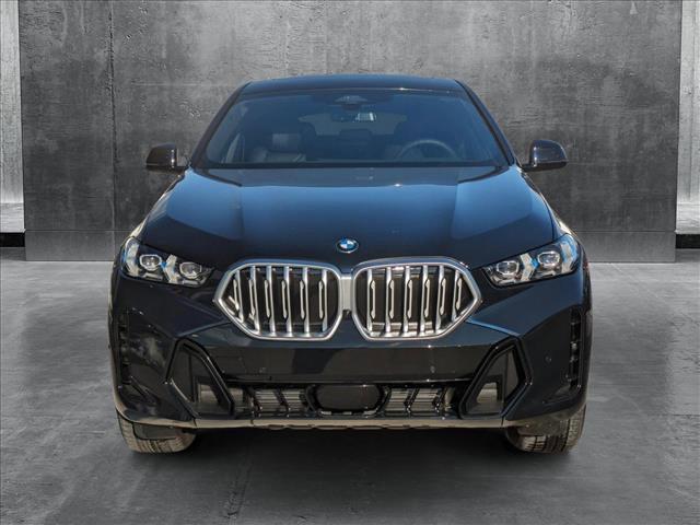 new 2025 BMW X6 car, priced at $77,875