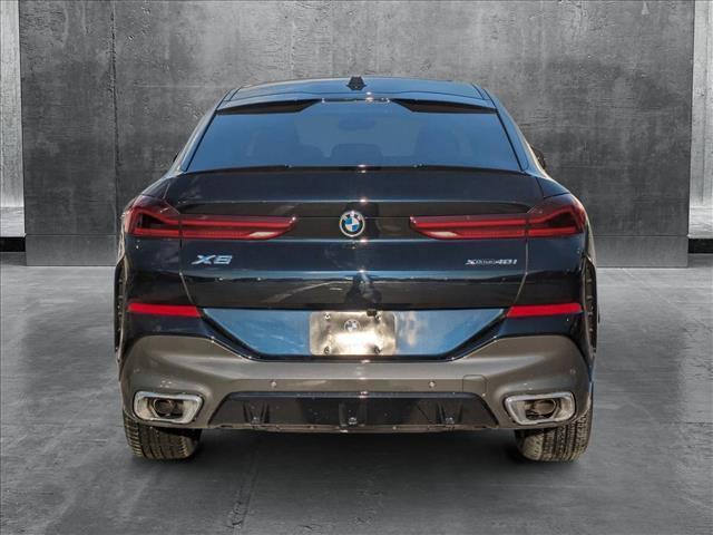 new 2025 BMW X6 car, priced at $77,875