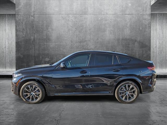 new 2025 BMW X6 car, priced at $77,875