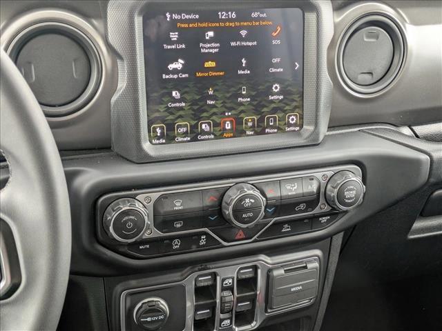 used 2023 Jeep Wrangler car, priced at $30,595