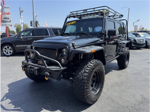 used 2015 Jeep Wrangler Unlimited car, priced at $17,995