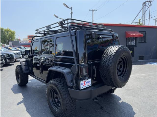 used 2015 Jeep Wrangler Unlimited car, priced at $17,995