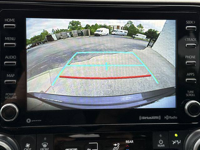 used 2021 Toyota Highlander Hybrid car, priced at $34,499