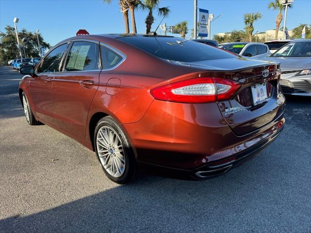 used 2015 Ford Fusion car, priced at $14,394