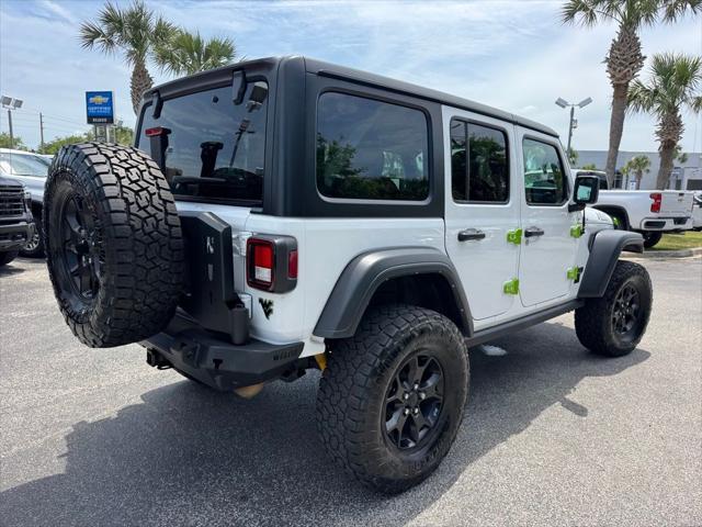 used 2021 Jeep Wrangler Unlimited car, priced at $33,976