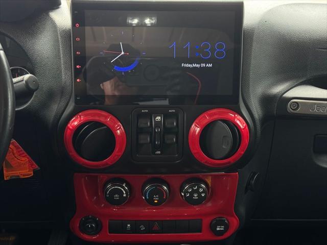 used 2015 Jeep Wrangler Unlimited car, priced at $17,799