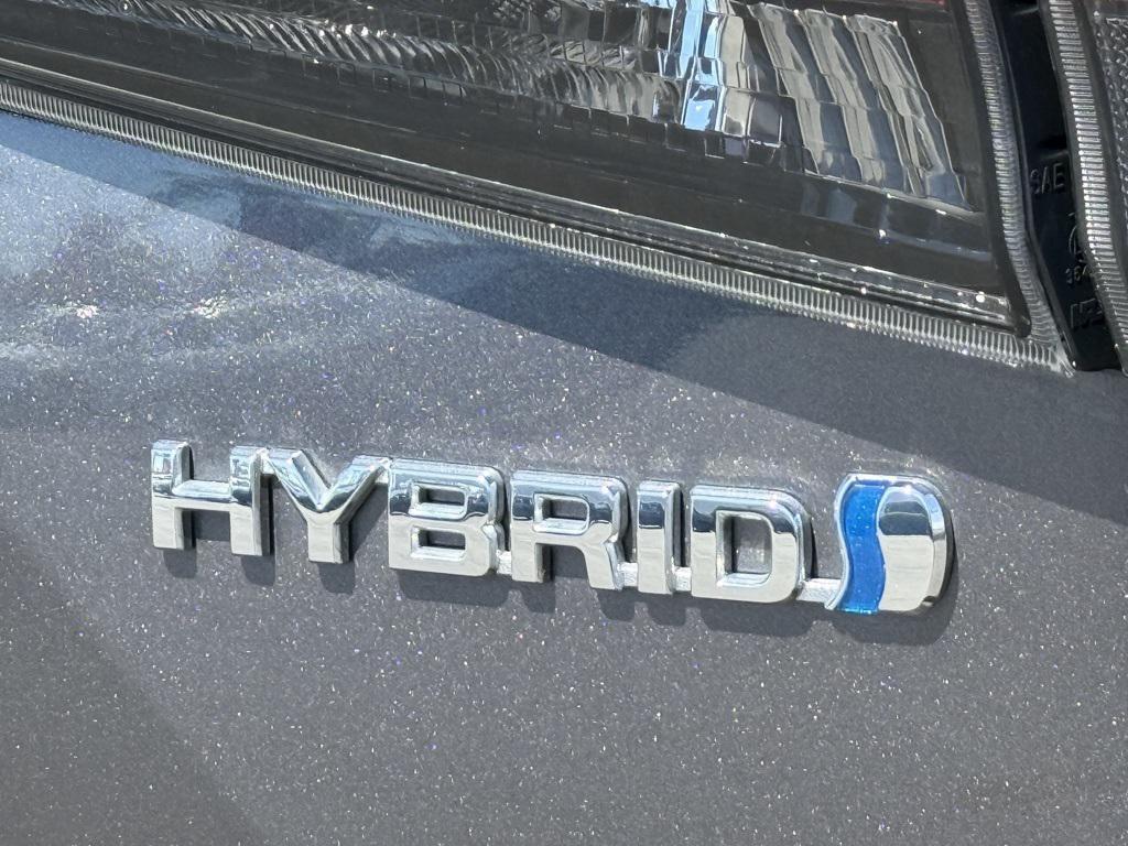 used 2022 Toyota Highlander Hybrid car, priced at $38,993