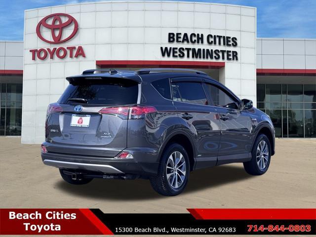 used 2018 Toyota RAV4 Hybrid car, priced at $20,999