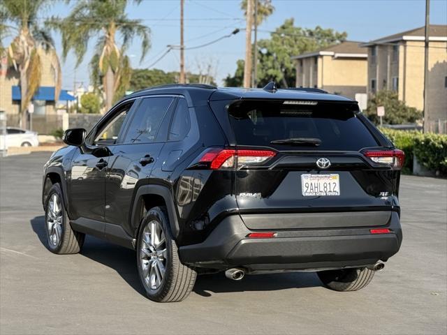 used 2021 Toyota RAV4 car, priced at $29,411