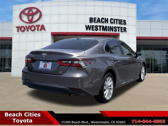 used 2021 Toyota Camry car, priced at $22,729