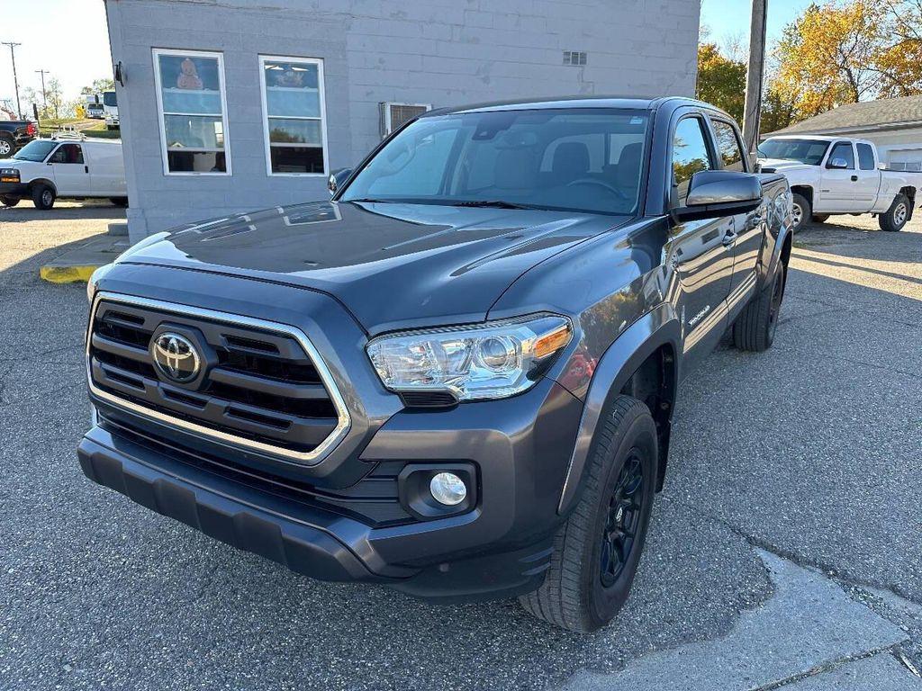 used 2019 Toyota Tacoma car, priced at $18,700