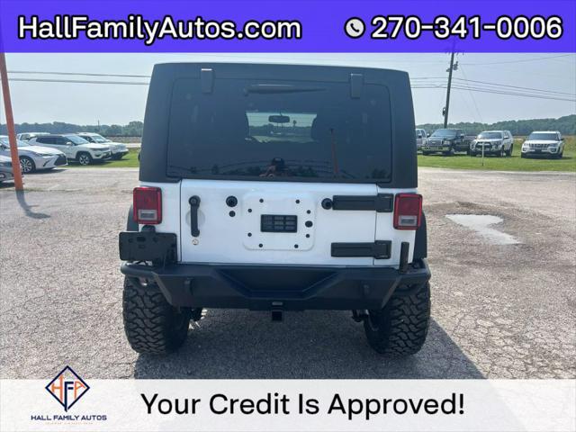 used 2016 Jeep Wrangler Unlimited car, priced at $21,999