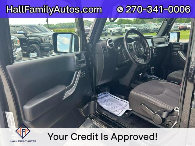 used 2015 Jeep Wrangler Unlimited car, priced at $20,999
