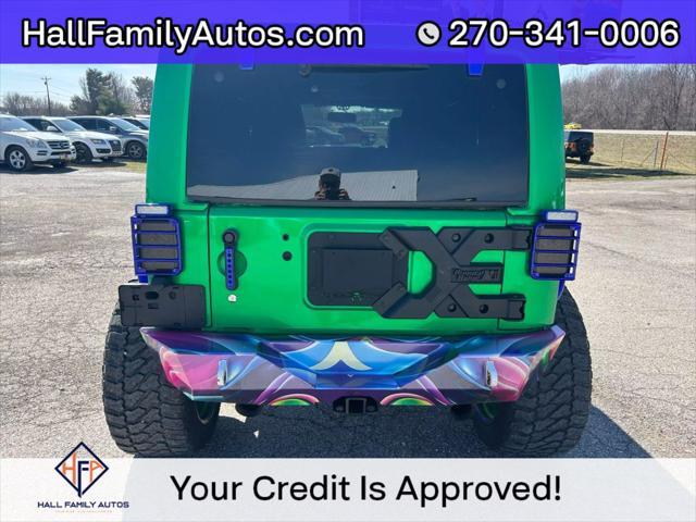 used 2016 Jeep Wrangler Unlimited car, priced at $25,999