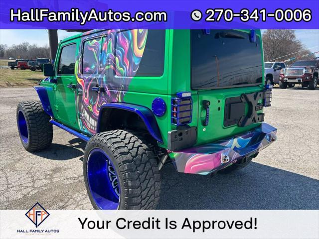 used 2016 Jeep Wrangler Unlimited car, priced at $25,999