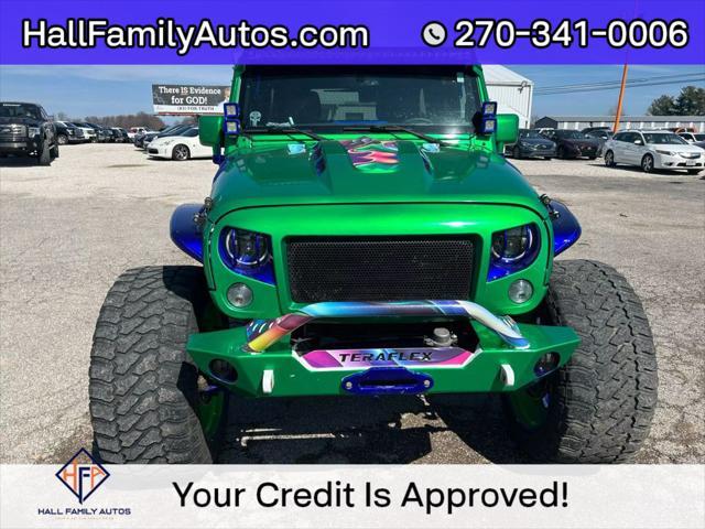 used 2016 Jeep Wrangler Unlimited car, priced at $25,999