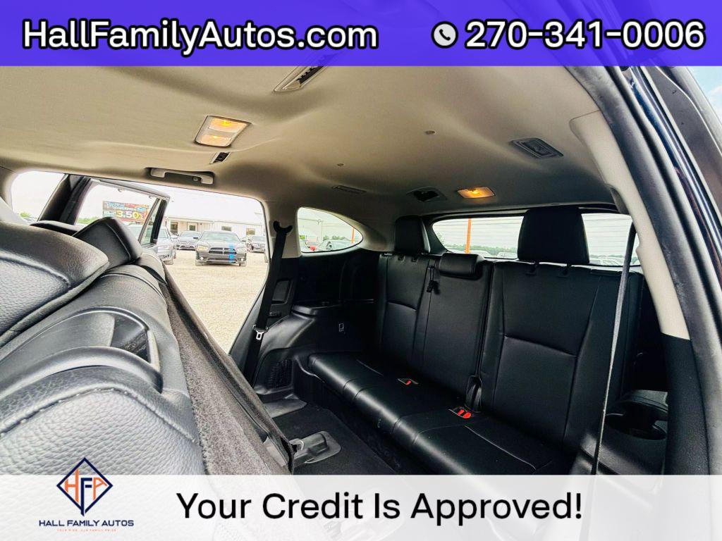 used 2020 Toyota Highlander Hybrid car, priced at $27,999