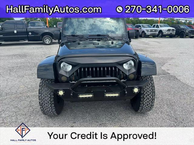 used 2015 Jeep Wrangler Unlimited car, priced at $20,999