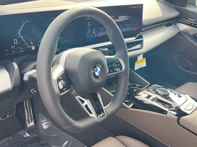 new 2025 BMW 530 car, priced at $72,825