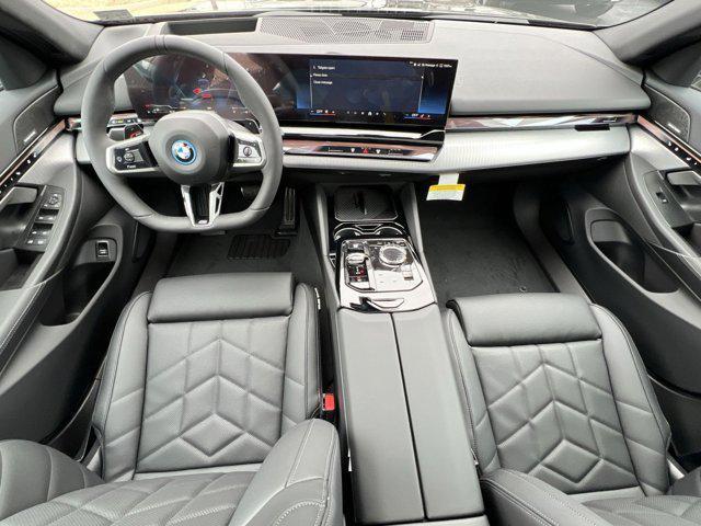 new 2025 BMW 550e car, priced at $86,325