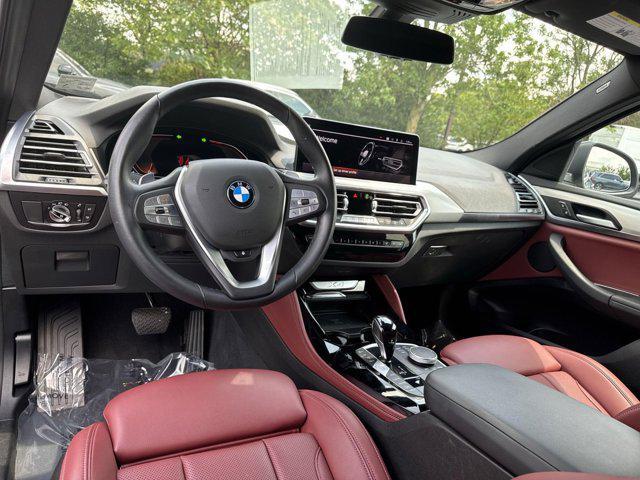 used 2023 BMW X4 car, priced at $44,400