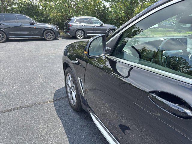 used 2023 BMW X4 car, priced at $44,400