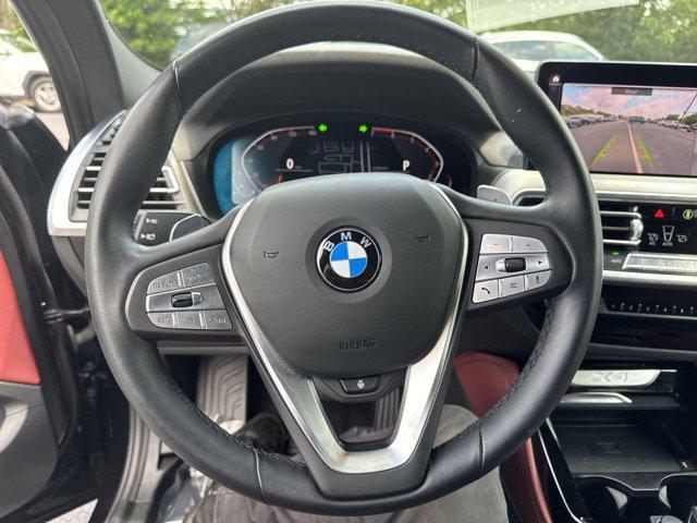 used 2023 BMW X4 car, priced at $44,400