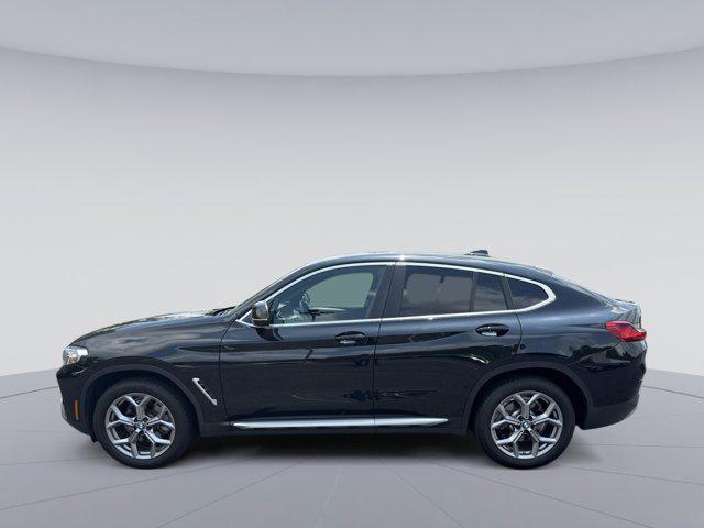 used 2023 BMW X4 car, priced at $44,400