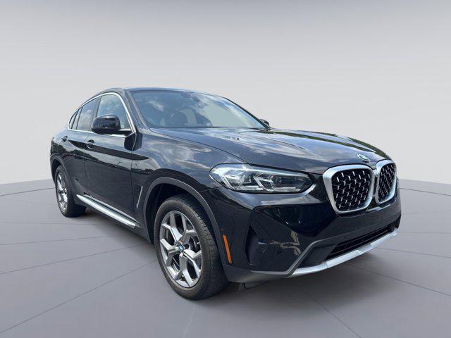 used 2023 BMW X4 car, priced at $44,750