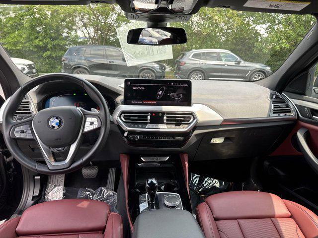 used 2023 BMW X4 car, priced at $44,400