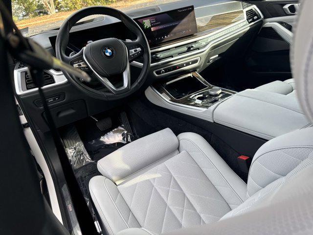 used 2024 BMW X5 car, priced at $58,000