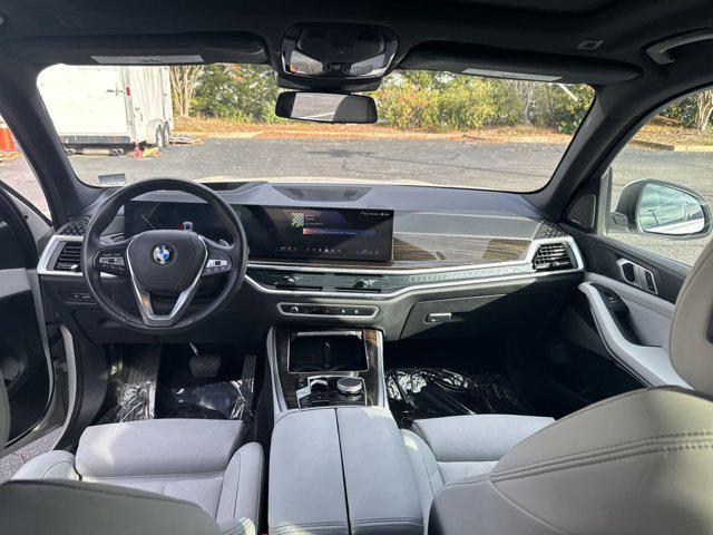 used 2024 BMW X5 car, priced at $58,000
