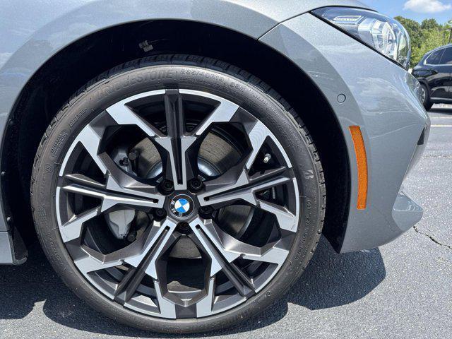 new 2025 BMW 330 car, priced at $53,895