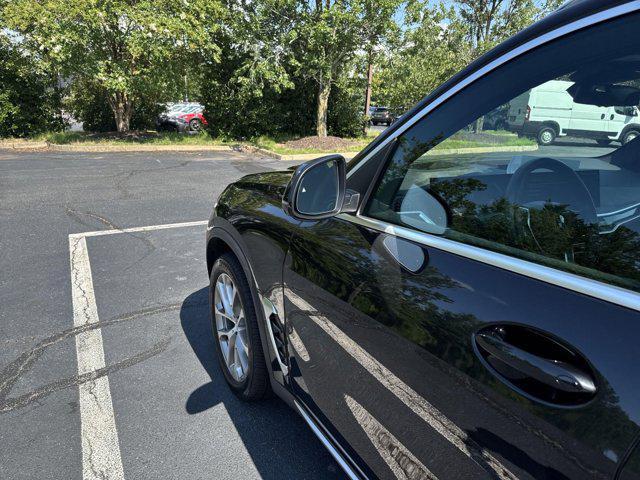 used 2024 BMW X5 car, priced at $68,000
