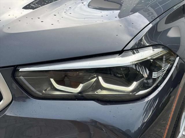 used 2022 BMW X6 car, priced at $52,600